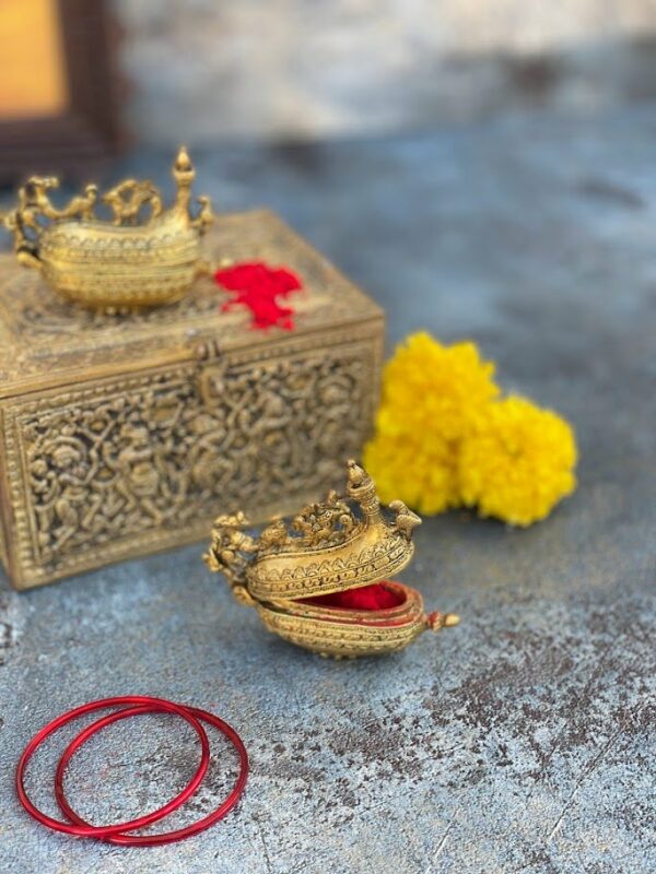 Athepoo-a brass antique gold ship kumkum box and two red colour bangles and yellow colour flowers