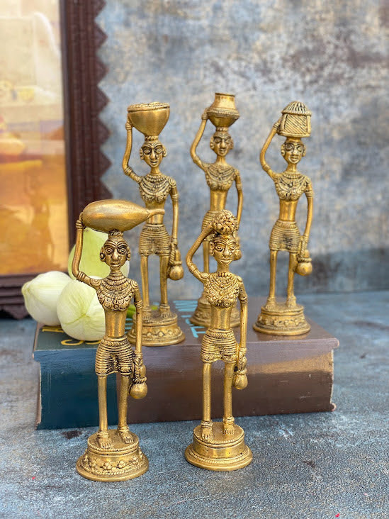 athepoo- A set of standing tribal lady statues with brass material