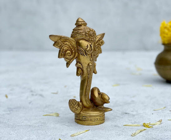 a brass ganesh trunk statue-athepoo